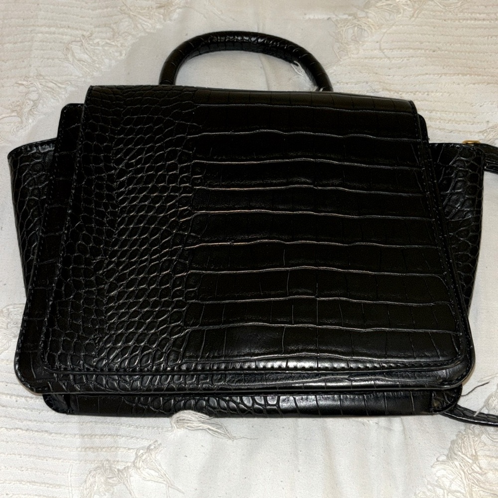 Black over the shoulder purse with magnetic latch